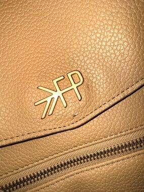 Freshly picked tan mini diaper bag